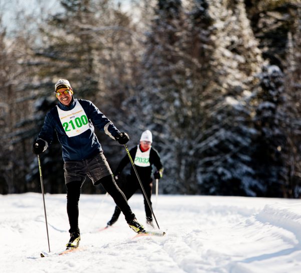 Two nordic skiers during the white pine stampede
