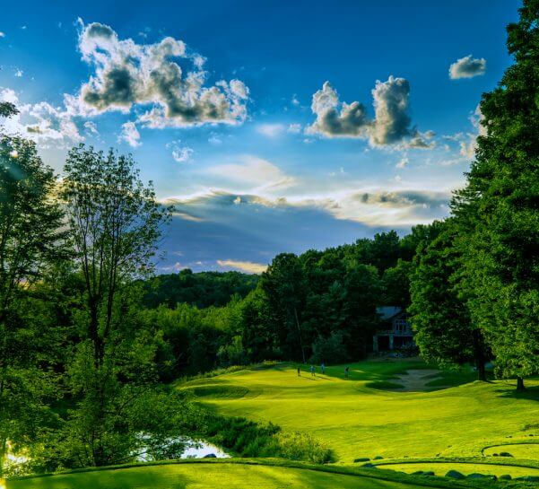 The Legend Hole 12 Green with Golfers on it