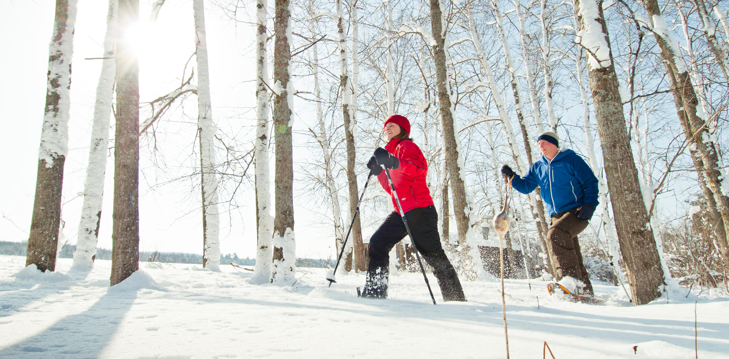 Couple snowshoeing together