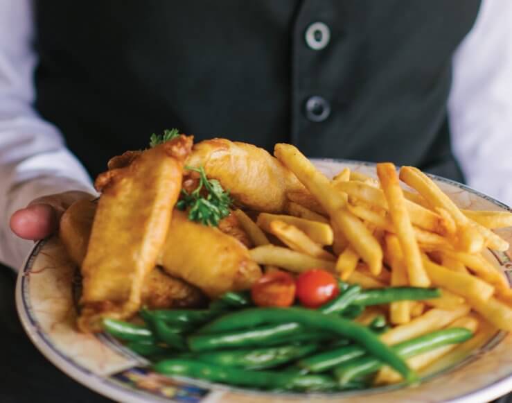 Fish and chips being served