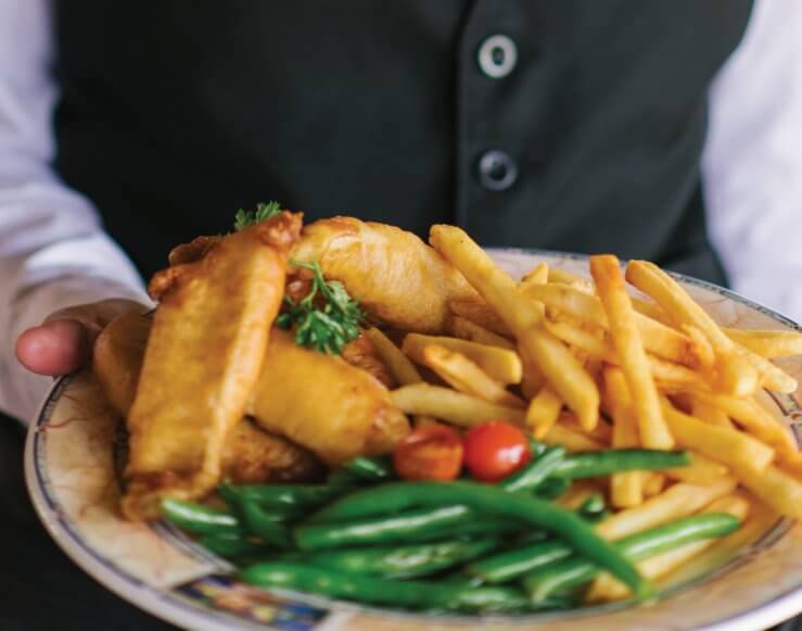 Fish and chips being served