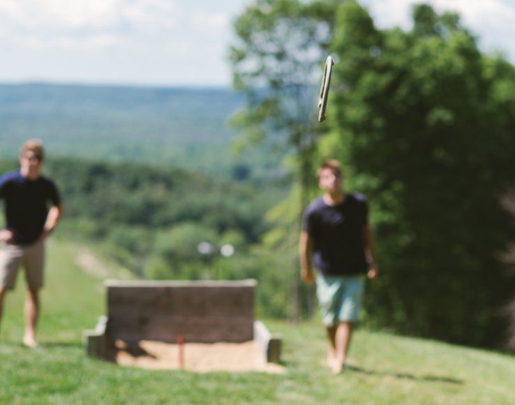 Men playing horseshoes