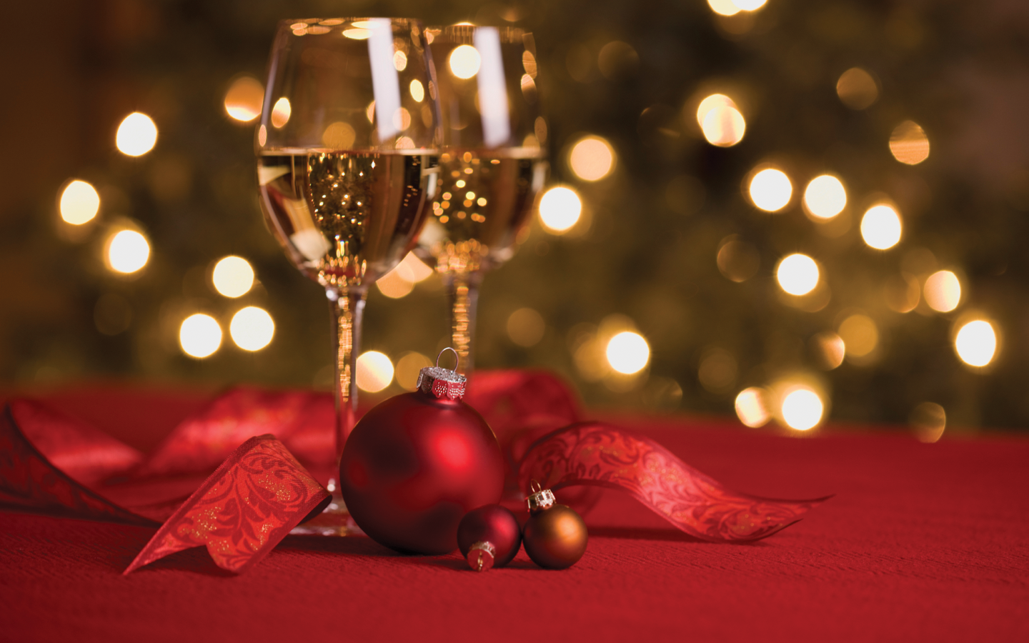 Wine and Ornaments in a Holiday Setting