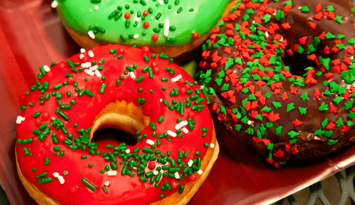 donuts with red and green holiday decorations