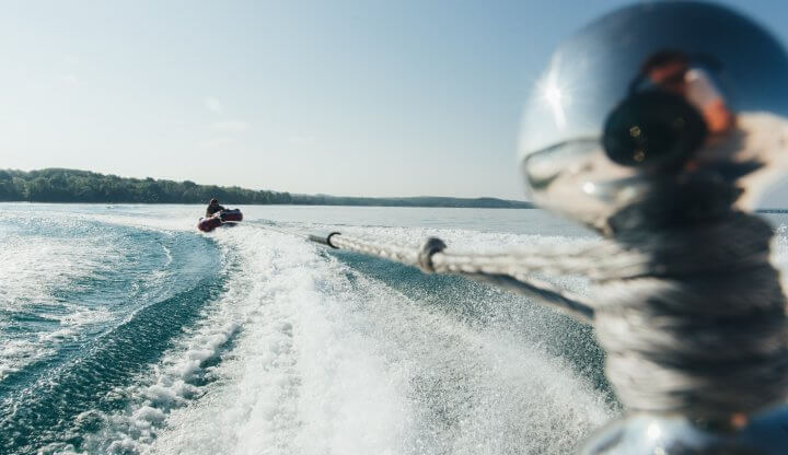Riding a tube on Torch Lake