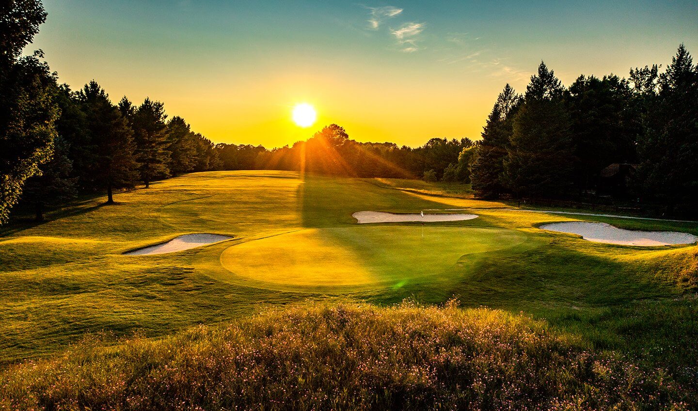 Summit GC Hole #13 - Standing behind the green looking at the fairway at sunset