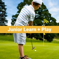 Junior Learn and Play - Young boy putting ball towards cup