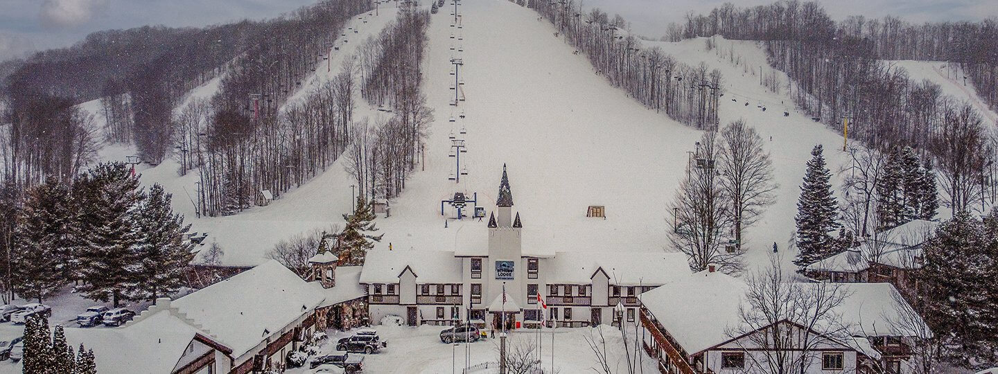 An aerial shot of Schuss Mountain overlooking the blue chairlift