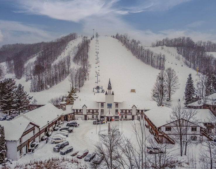 An aerial shot of Schuss Mountain overlooking the blue chairlift