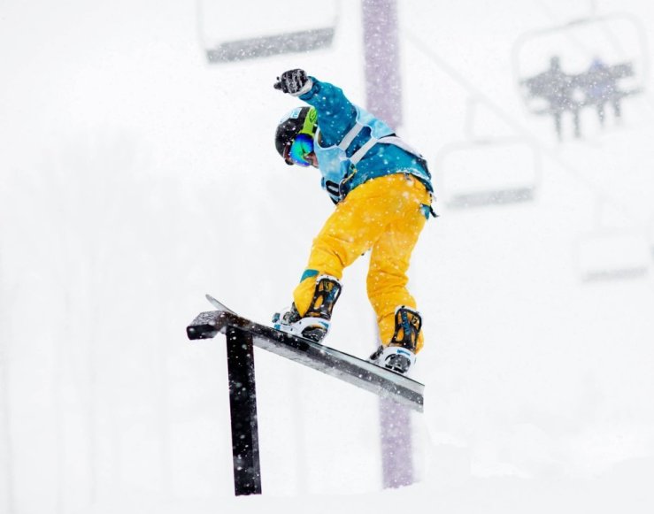 Snowboarder on terrain park