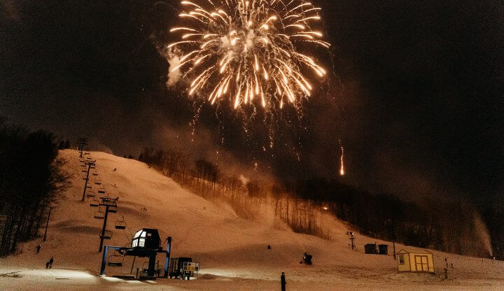 White Fireworks over Schuss Mountain at night.