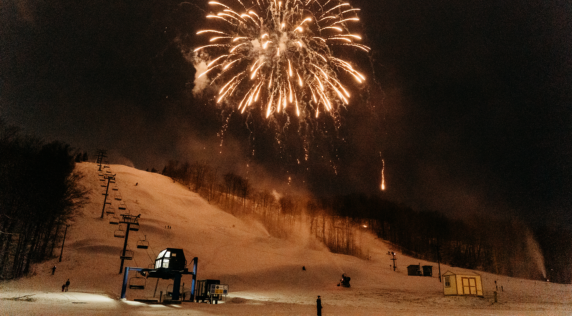White Fireworks over Schuss Mountain at night.