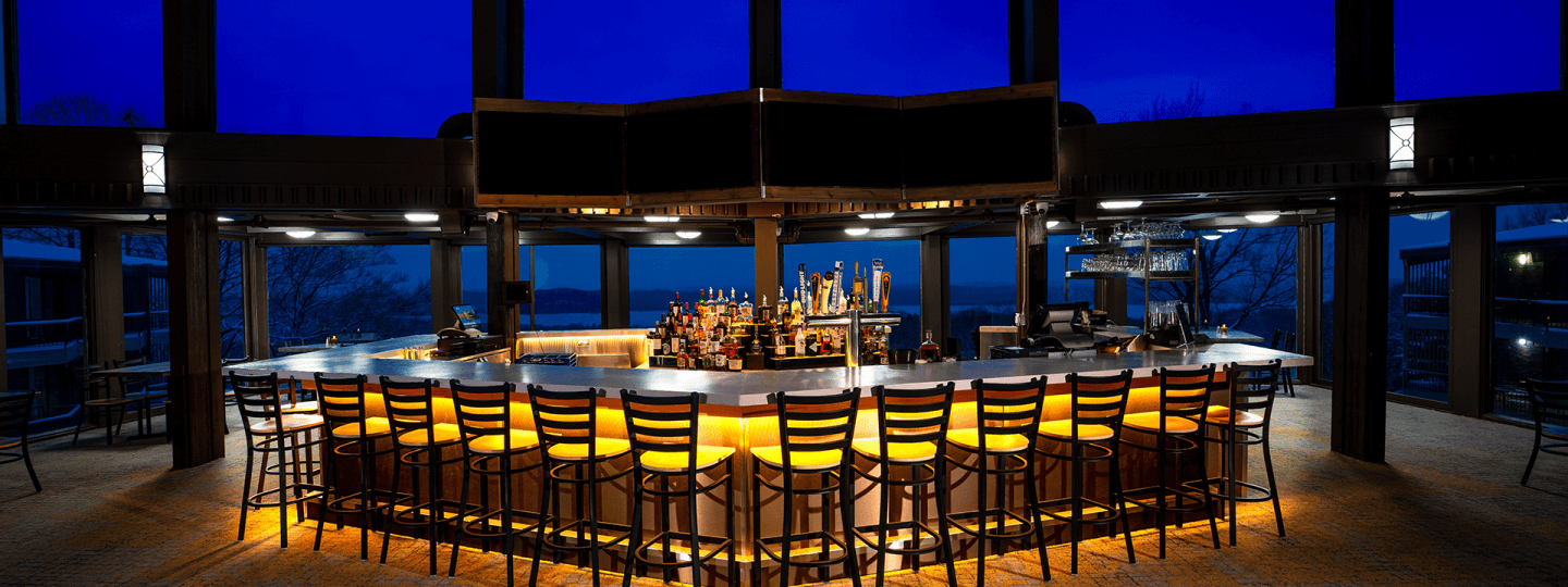 The Lakeview Restaurant Bar with Bar stools infront of the bar