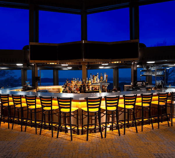 The Lakeview Restaurant Bar with Bar stools infront of the bar