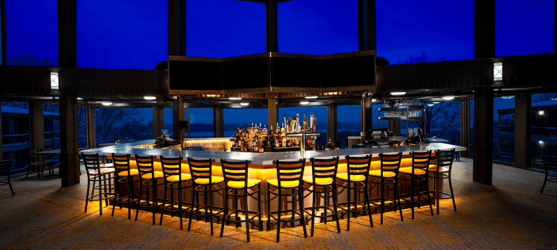 The Lakeview Restaurant Bar with Bar stools infront of the bar