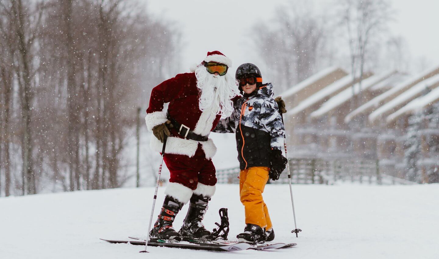 kid skiing with santa