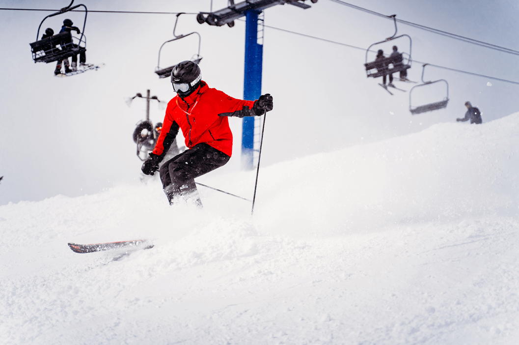 Skier schussing down Kingdom Come on Schuss Mountain's Blue Chairlift