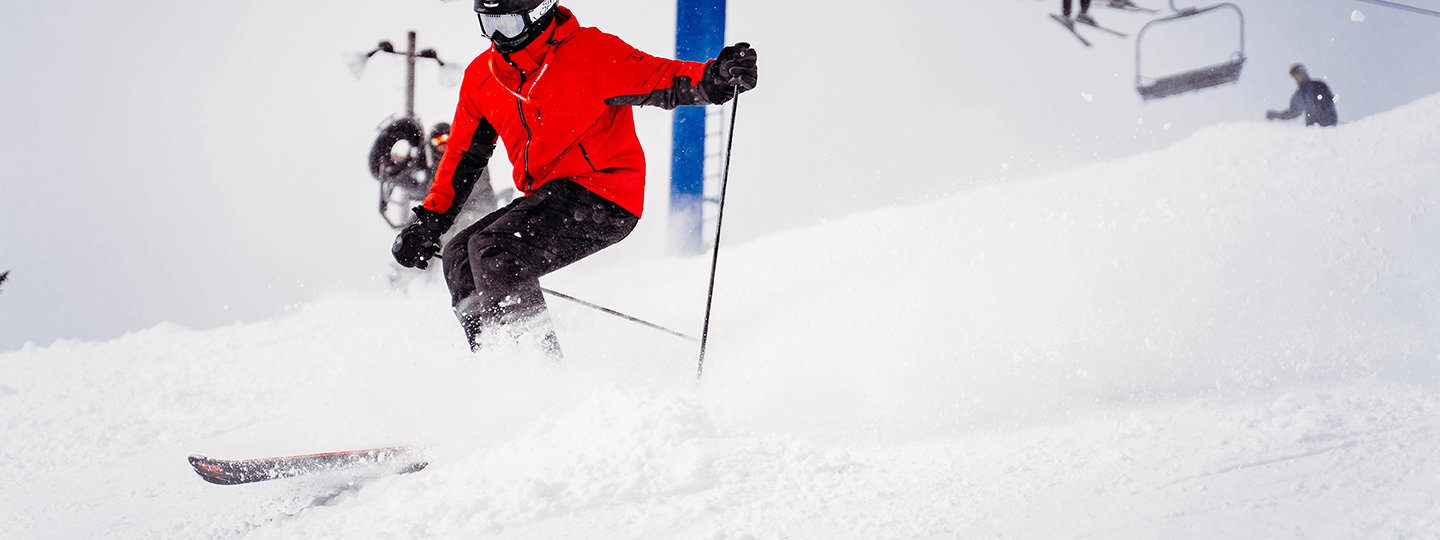 Skier schussing down Kingdom Come on Schuss Mountain's Blue Chairlift