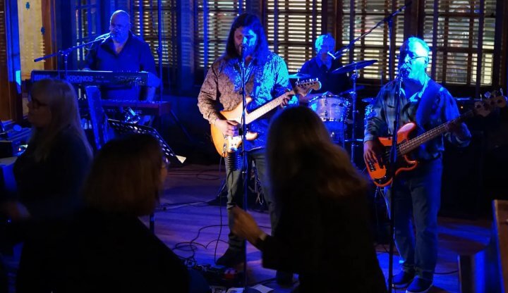 Image showing the On The Fly playing at one of their gigs